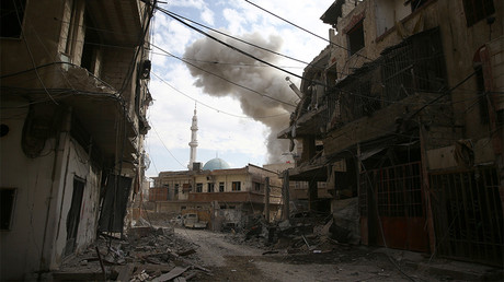 FILE PHOTO: Smoke rises from the rebel held besieged town of Hamouriyeh, eastern Ghouta, near Damascus, Syria © Bassam Khabieh