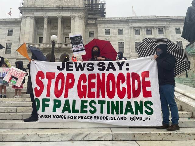 Students, community members rally at State House in support of ...